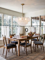 Modern White Disc Art Glass Chandelier in Cozy Dining Room