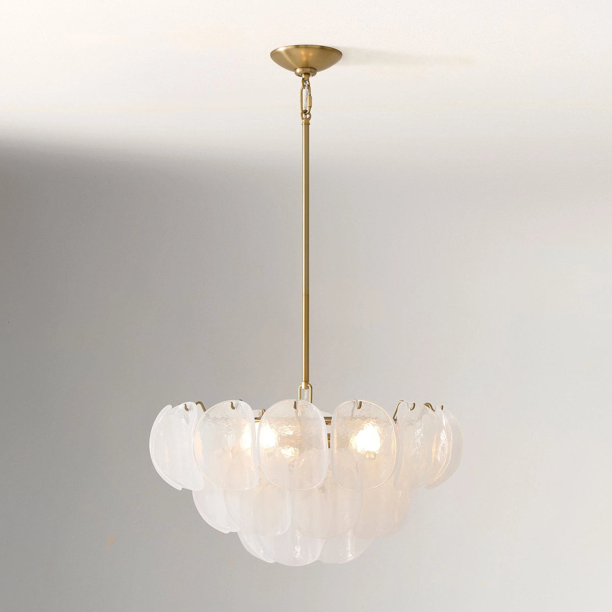 Illuminated Modern White Disc Art Glass Chandelier Studio Shot