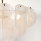 Close Up View of White Disc Glass Shades and Internal Bulbs Structure