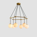 Illuminated Modern Brass Ring and Multi-Sphere Alabaster Chandelier Studio Shot on White Background