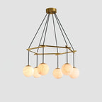 Illuminated Modern Brass Ring and Multi-Sphere Alabaster Chandelier Studio Shot on White Background