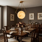 Modern Brass Chain Pendant Light in Elegant Dining Room Interior