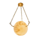 Modern Brass Chain and Alabaster Sphere Pendant Light with Warm Light on Pure White Background