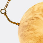 Close Up View of Brass Hanging Chain and Alabaster Sphere Mount Connection Details