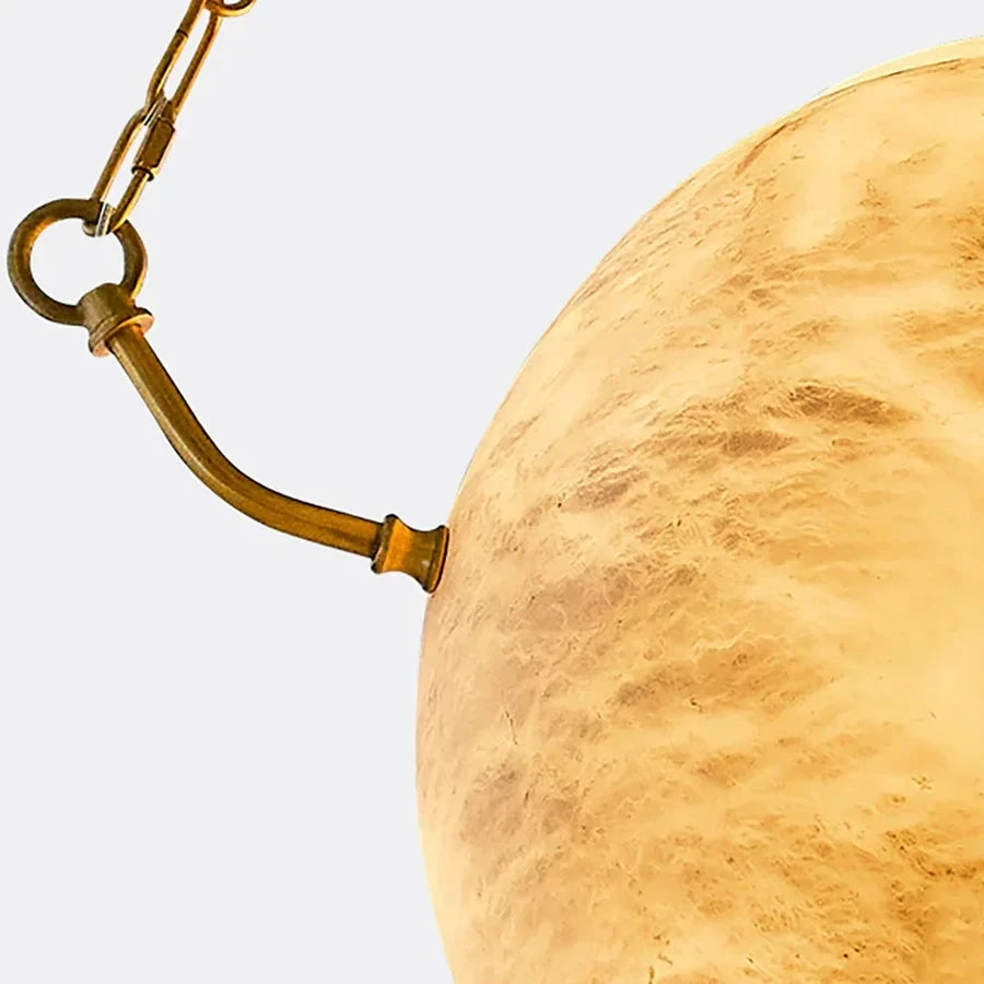 Close Up View of Brass Hanging Chain and Alabaster Sphere Mount Connection Details