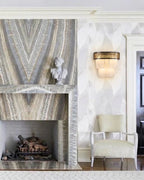 Modern Pierced Metal Band Wall Sconce in Sophisticated Interior Setting   