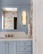 Modern Brass Trim Wall Sconce in Luxury Bathroom Vanity Space
