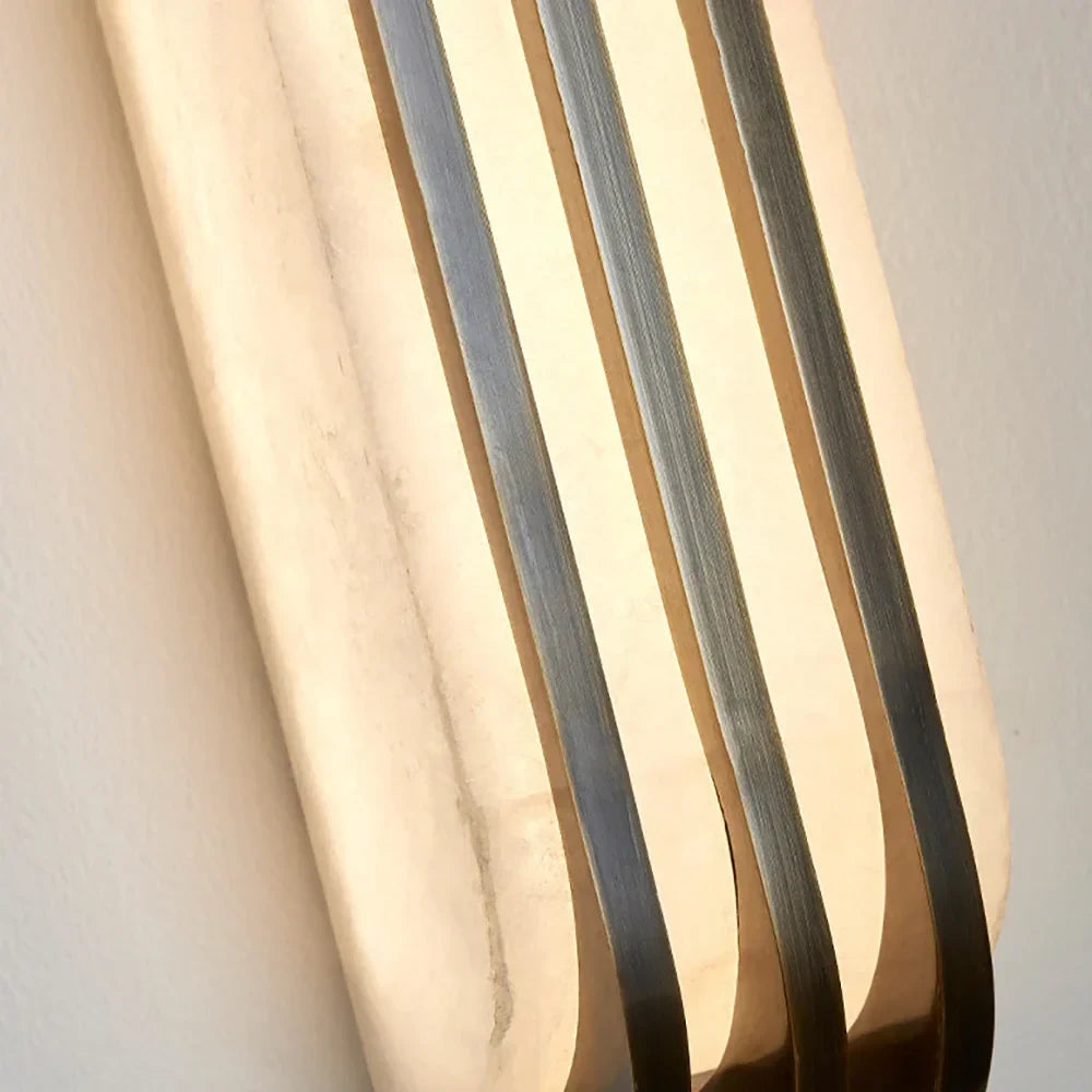 Close Up View of Vertical Metal Trim and Alabaster Stone Connection Details