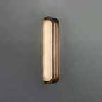 Illuminated Modern Metal Trim Wall Sconce Studio Shot on Grey Background