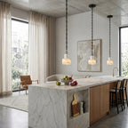 Modern Black Frame Alabaster Pendant Light Over Dining Room Table