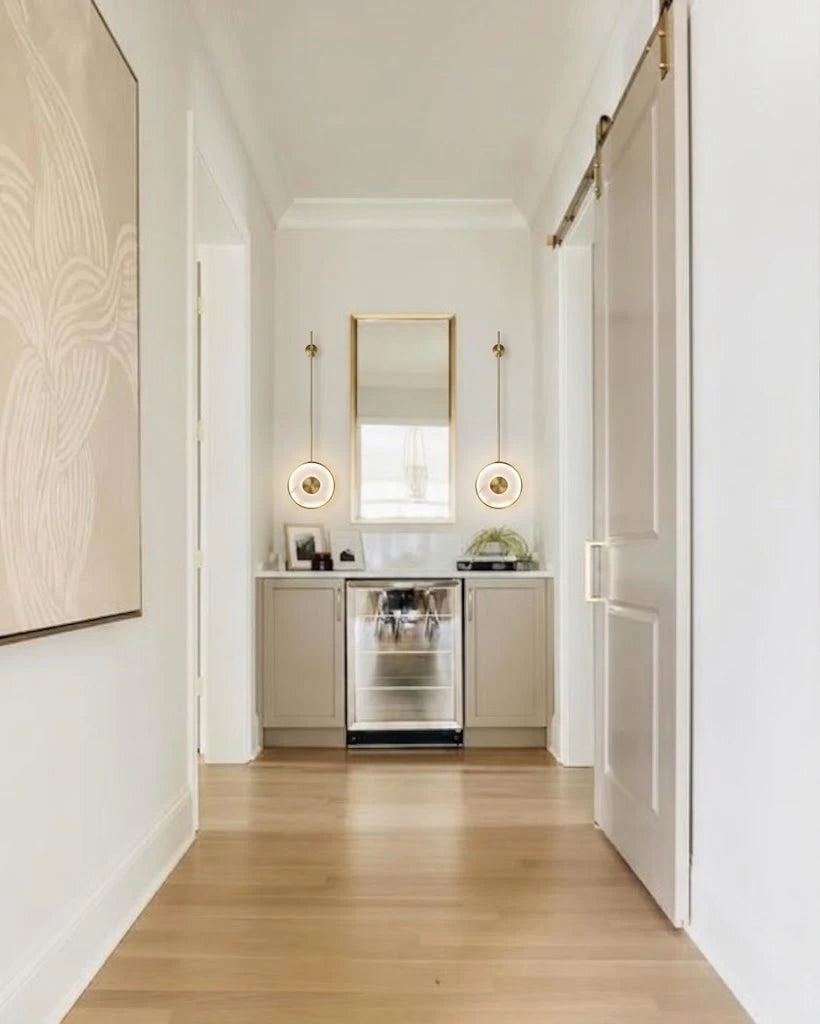 Modern Brass Pendant Rod Wall Sconce in Sophisticated Hallway Corridor