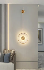 Modern Brass Pendant Rod Wall Sconce in Elegant Living Room