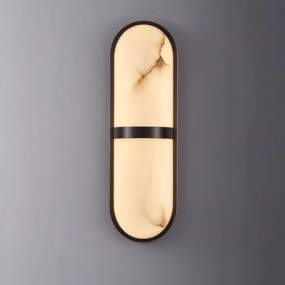 Illuminated Modern Brass Center Band Wall Sconce Studio Display on Grey Background