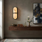 Modern Brass Center Band Wall Sconce in Contemporary Living Space