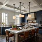Modern Black Frame Alabaster Globe Chandelier Over Kitchen Breakfast Bar