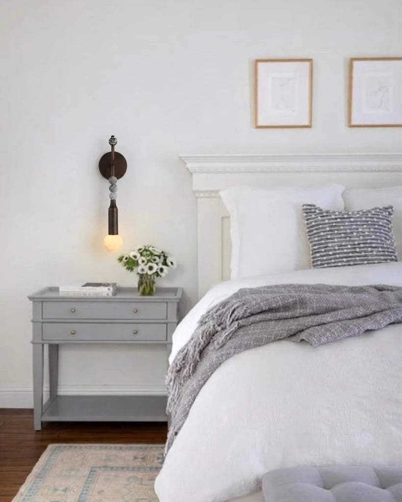 Modern Metal Rod Wall Sconce in Minimalist Bedroom Interior   