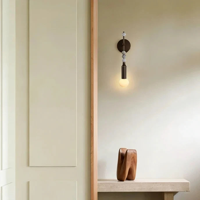 Modern Beaded Marble Wall Sconce in Elegant Hallway Corridor   