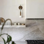 Modern Metal Rod Wall Sconce in Sophisticated Kitchen Space   