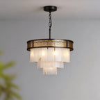 Illuminated Modern Tiered Alabaster and Pierced Metal Band Chandelier Studio Shot on Grey Background
