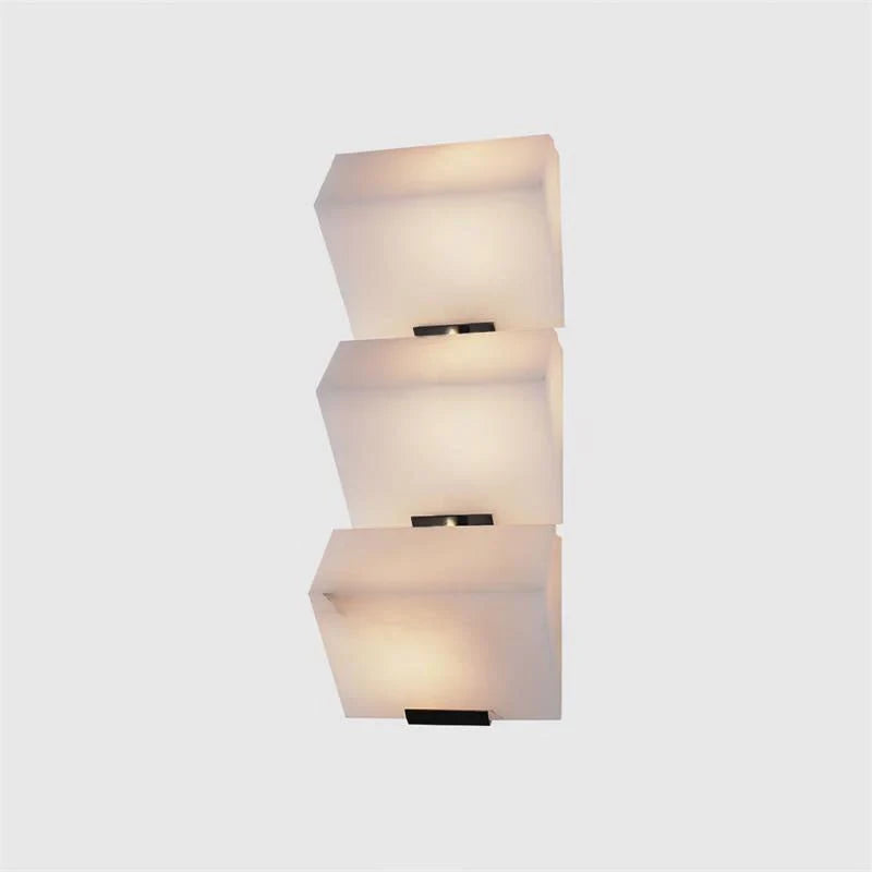 Illuminated Modern Triple-Tier Natural Marble Cube Wall Sconce Studio Shot