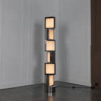Illuminated Modern Alabaster Square Block Floor Lamp Studio Shot on Dark Background   