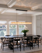 Modern Long Oval Pendant Light in Grand Dining Room Interior