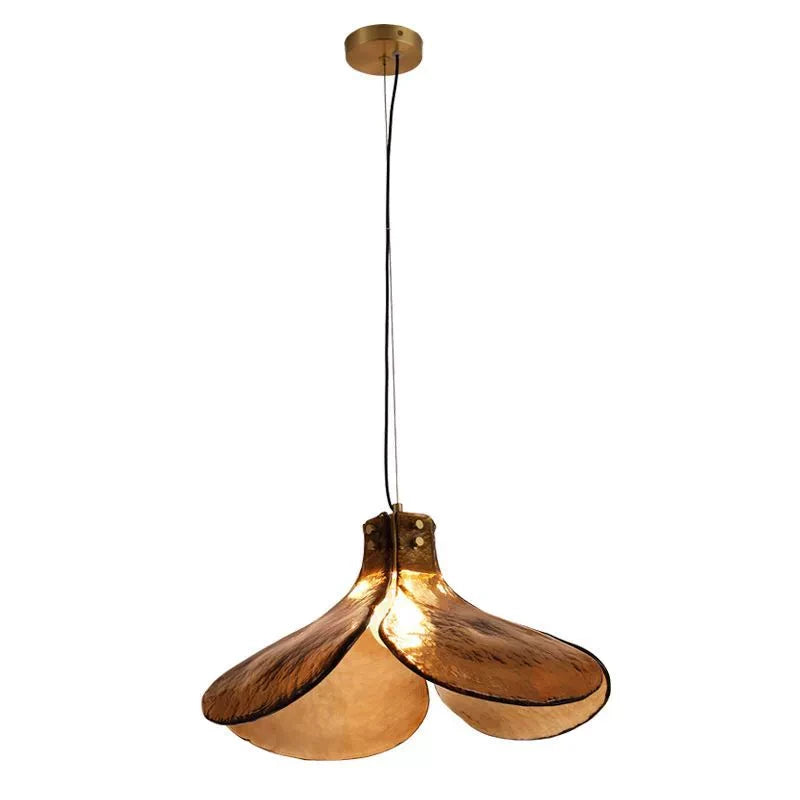 Illuminated Modern Brass Amber Petal Pendant Light Studio Shot on White Background