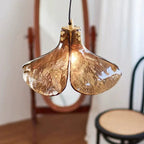 Modern Amber Petal Art Glass Pendant Light in Ambient Indoor Setting