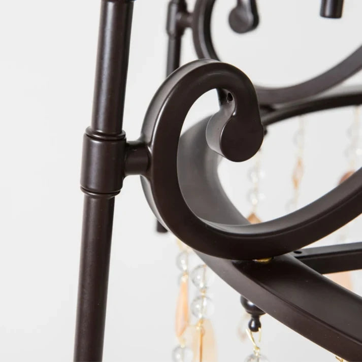 Close Up View of Black Metal Arm Scrollwork