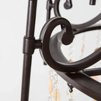 Close Up View of Black Metal Arm Scrollwork