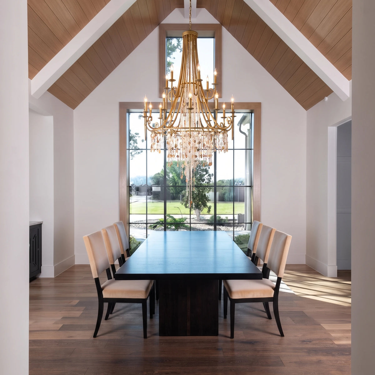 Luxury Crystal Chandelier Over Long Formal Dining Table