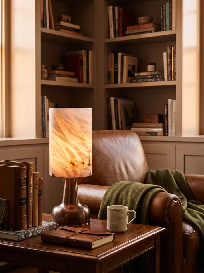 Alabaster Table Lamp on Living Room Side Table by Bookshelf