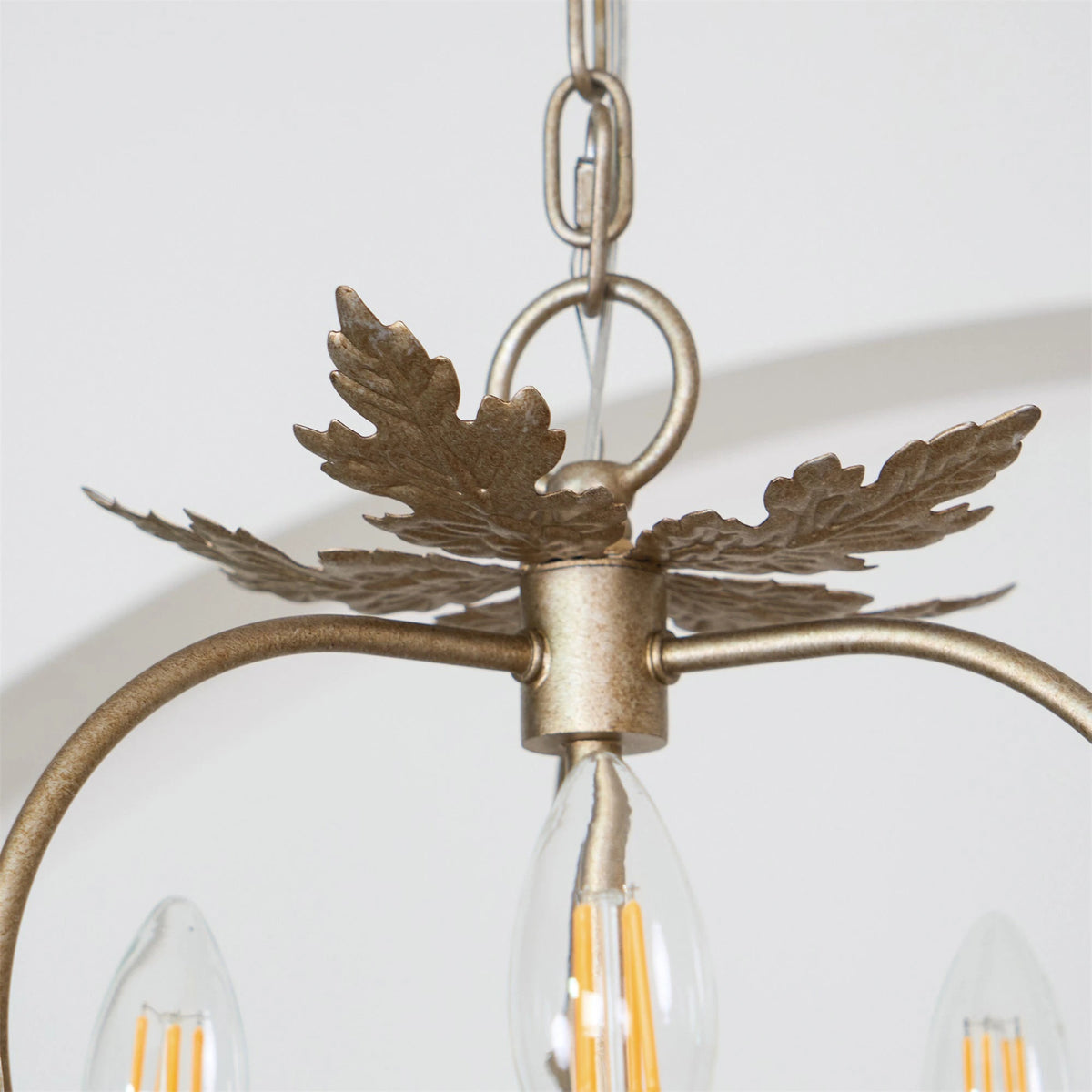 Detail of Top Brass Leaf Canopy and Hanging Chain Attachment