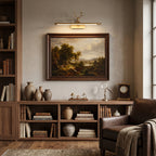 Brass Antler Picture Light Illuminating Wall Art Over Credenza