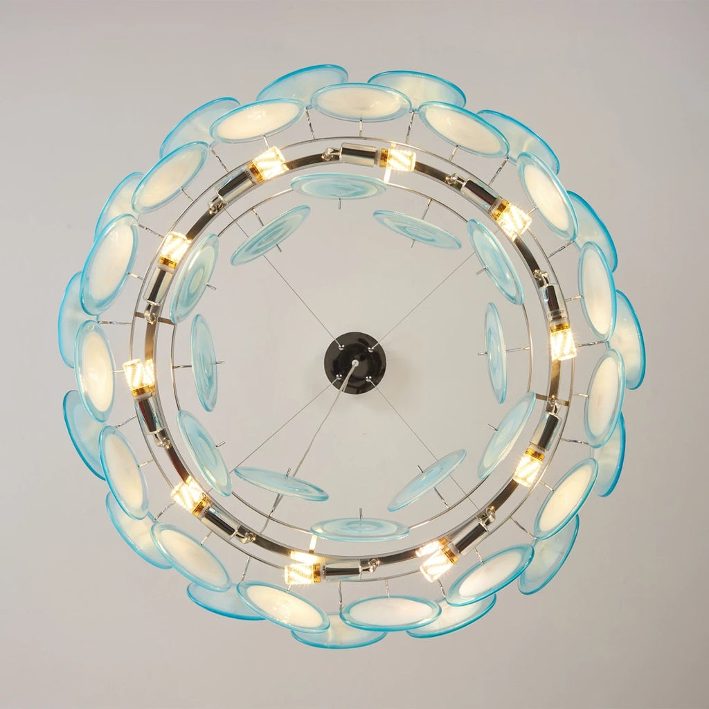Upward View of Illuminated Modern Teal Layered Wave Disc Chandelier Studio Shot