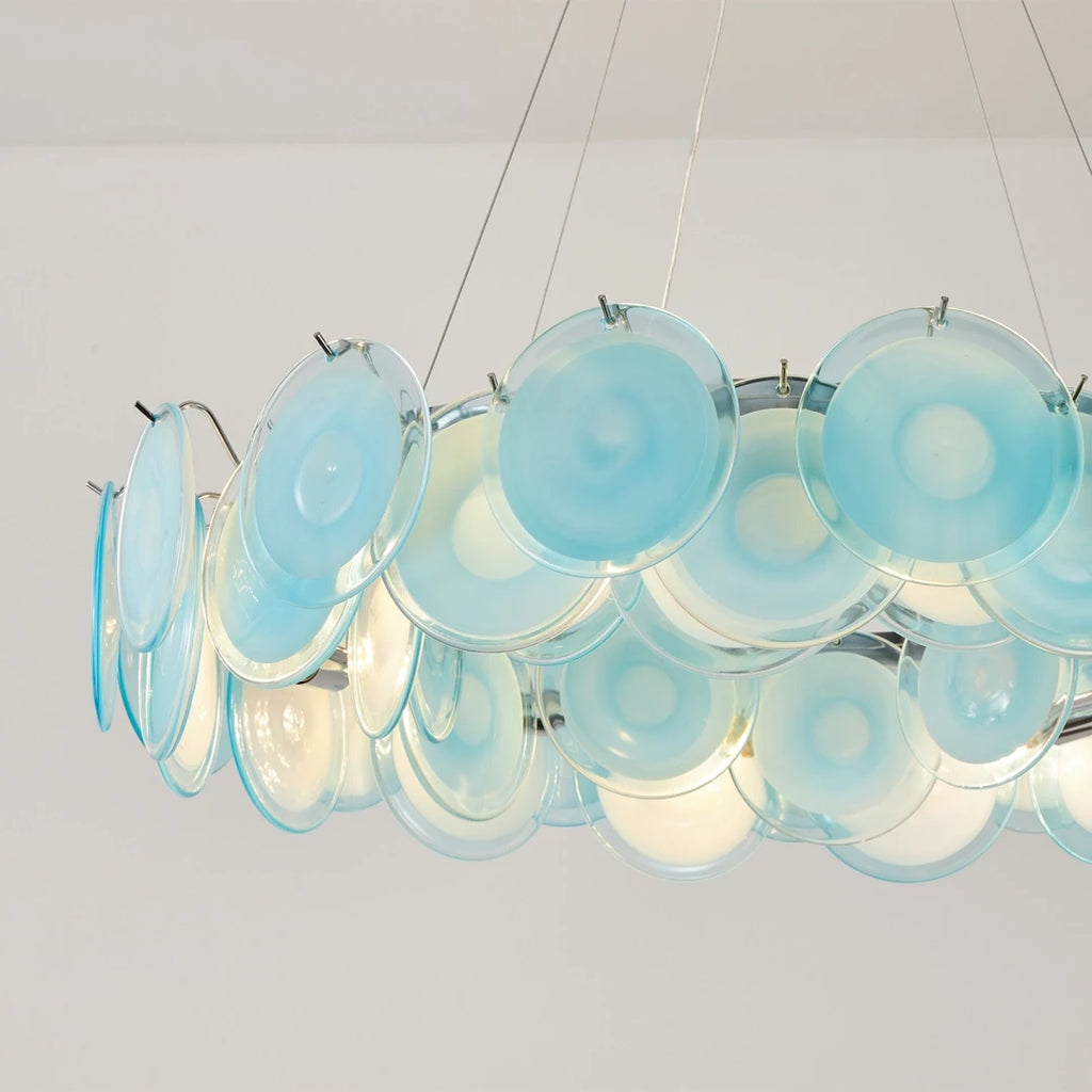 Illuminated Modern Silver Frame Teal Wave Disc Chandelier Studio Shot