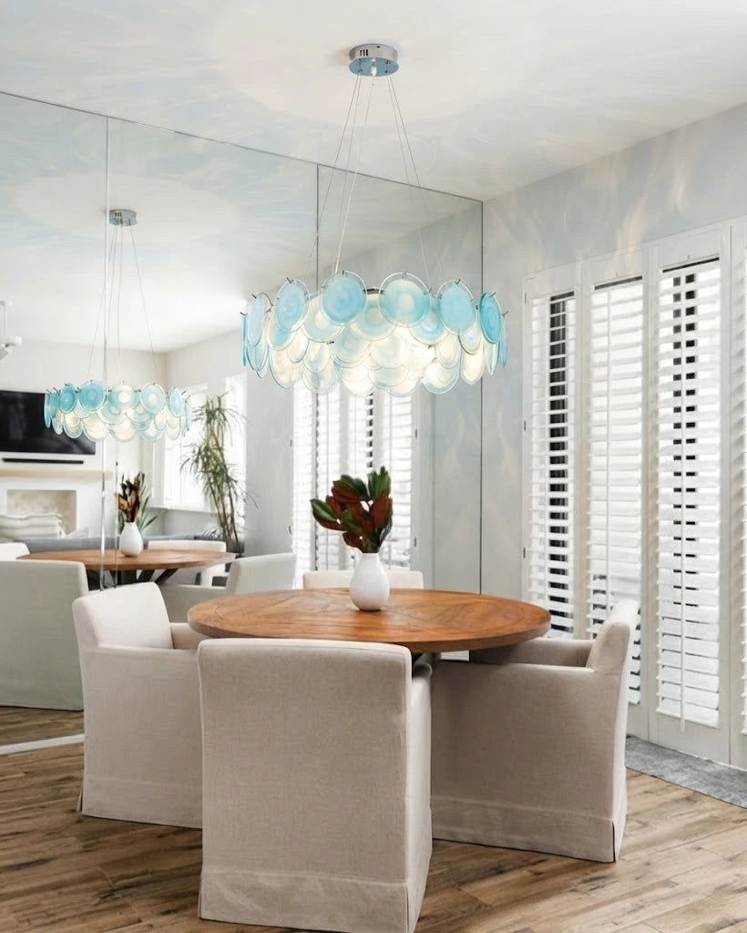 Modern Teal Layered Wave Disc Art Glass Chandelier Over Round Dining Table