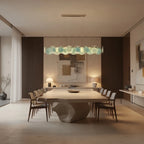 Modern Silver Frame Teal Wave Disc Linear Chandelier in Luxury Dining Interior