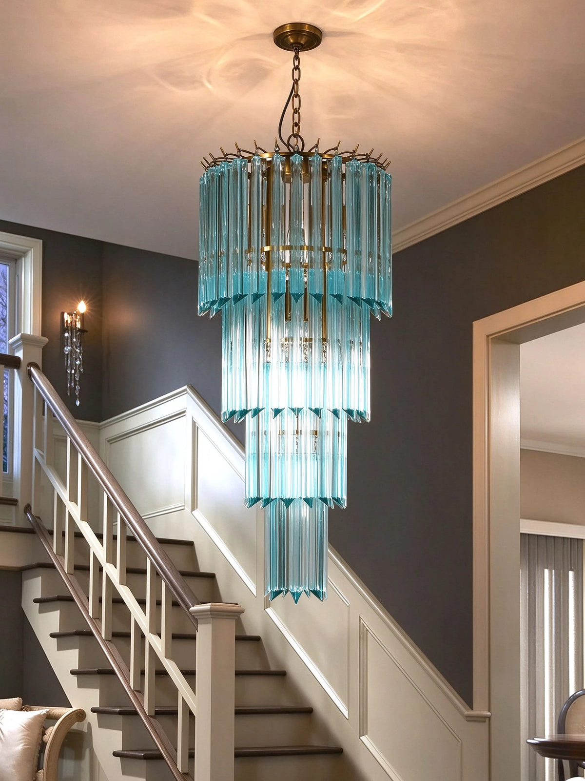 Modern Blue Tiered Crystal Glass Chandelier Along Staircase Foyer