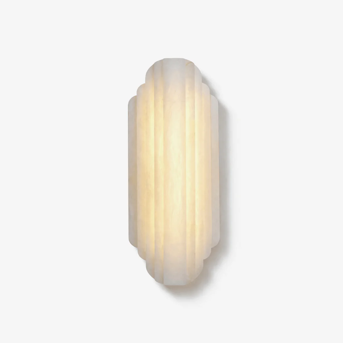 Arcadia Tiered Alabaster Sconce glowing minimalist product view white background