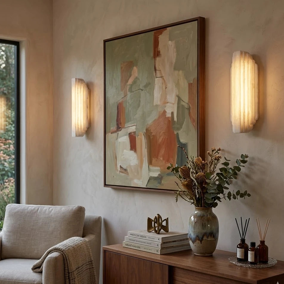 Modern Alabaster Wall Sconces Over Credenza and Artwork