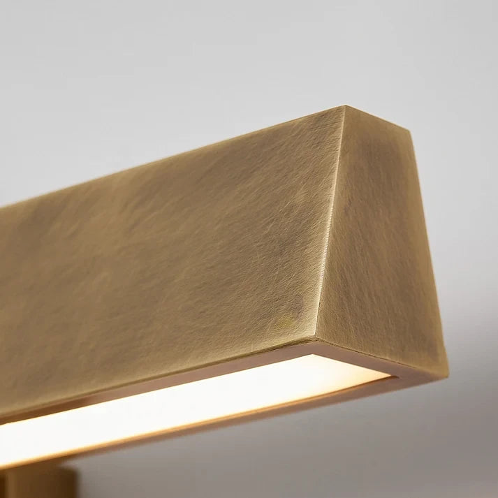 Angled View of Illuminated Rectangular Brass Linear Picture Light