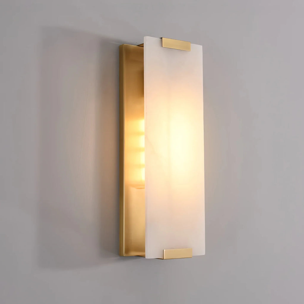 Illuminated Modern Brass Alabaster Flat Wall Sconce Studio Shot on Grey Background