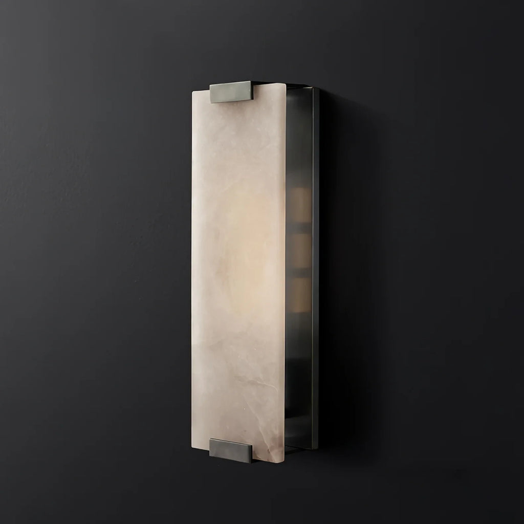 Illuminated Modern Dark Finish Alabaster Wall Sconce Studio Display on Dark Background