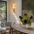 Modern Alabaster Wall Sconce in Elegant Dining Space Setting   