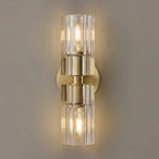 Close Up View of Illuminated Modern Brass Crystal Cylinder Art Glass Wall Sconce Studio Shot
