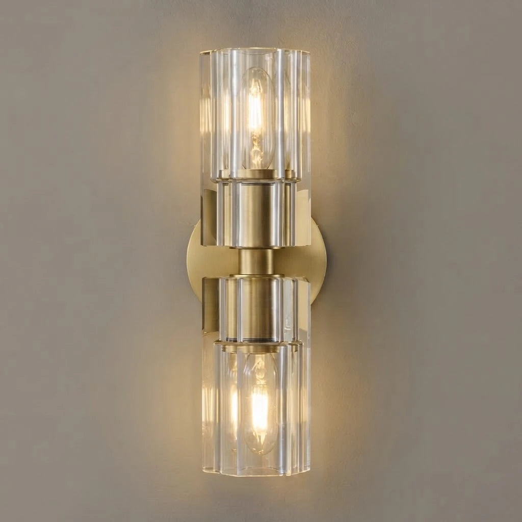 Close Up View of Illuminated Modern Brass Crystal Cylinder Art Glass Wall Sconce Studio Shot