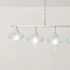 Angled View of Illuminated 7-Light Star Art Glass Linear Chandelier