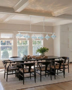 Modern Star Art Glass Linear Chandelier in Formal Dining Room