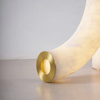 Close Up View of Curved Alabaster Leg and Brass Base Trim